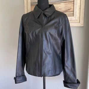 Attention Black leather jacket size L.